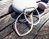 Hammered 14k goldfill hoops. Pointed Marquise shape. Delicate, light earrings
