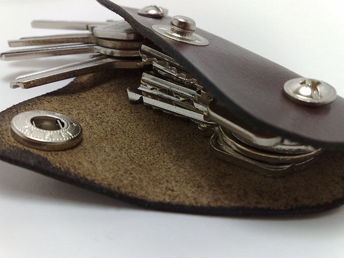 Extremely convenient keychain key holder from dark brown cowhide. Holds 6-8 regular keys, free monogramming , personalized/ belt hanger