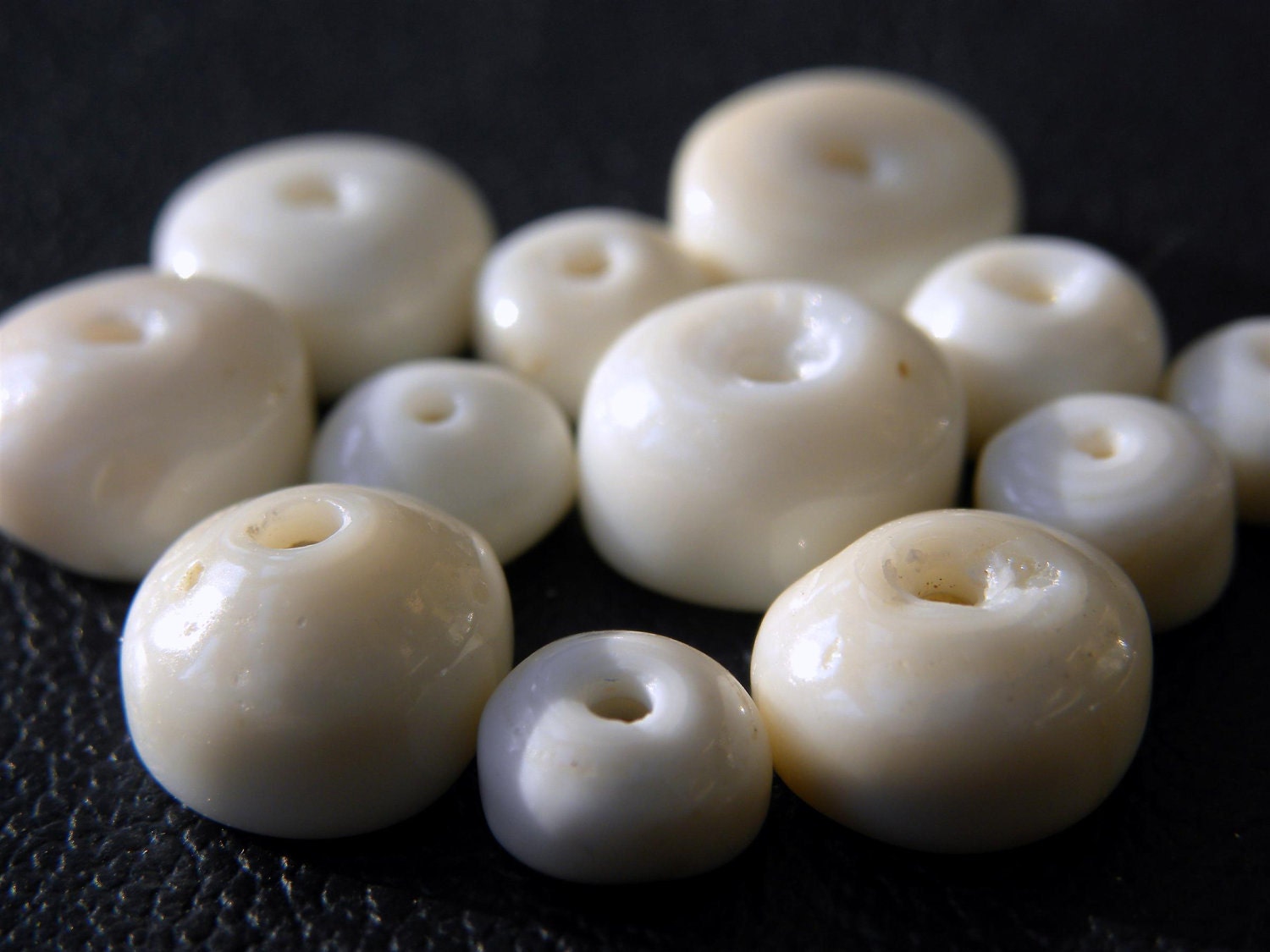 Hawaiian Puka Shells, jewelry making supplies, 25 med/large shells, 6-10mm