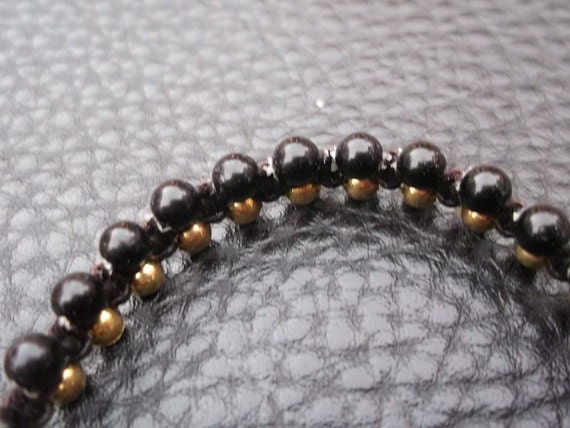 Black balls brass bracelet