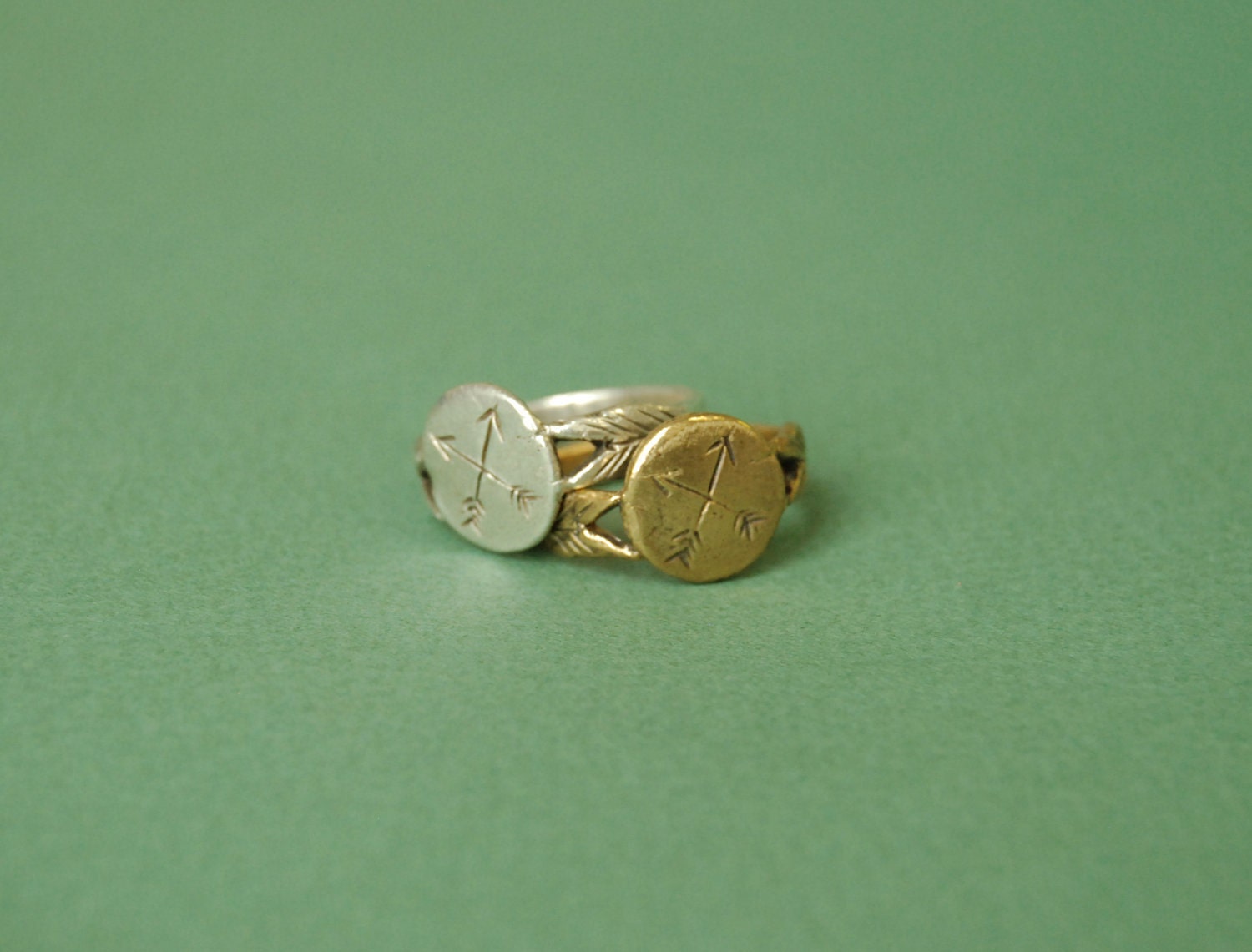 Silver crossed arrows signet ring