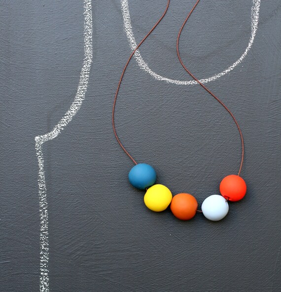 not quite round handmade beads make a necklace