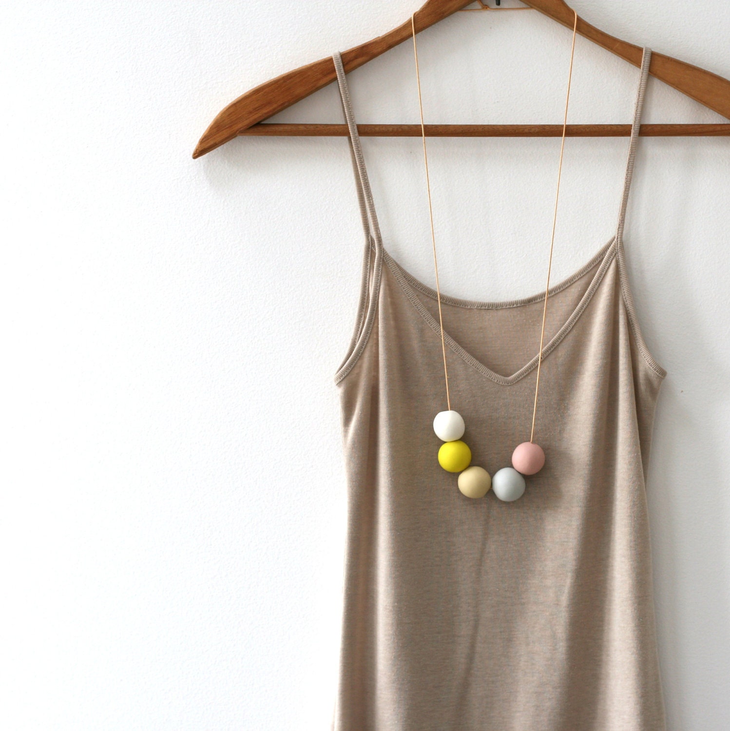 not quite round handmade beads make a necklace