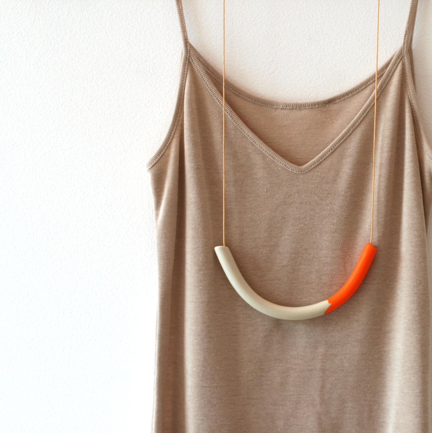 not quite a semi circle makes a necklace