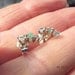 3 stone earrings with emeralds