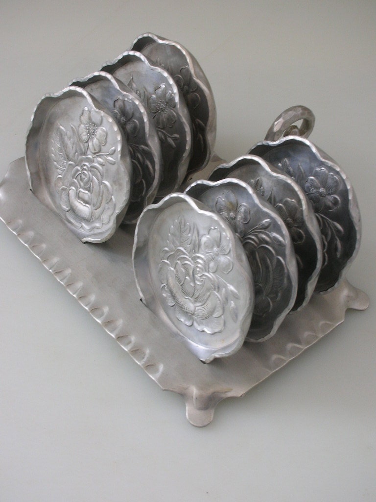 Everlast Forged Aluminum Coaster Set of 8 with Footed Caddy Hammered Coaster Set 9 pc Roses Pansy from The Back Part of the Basement