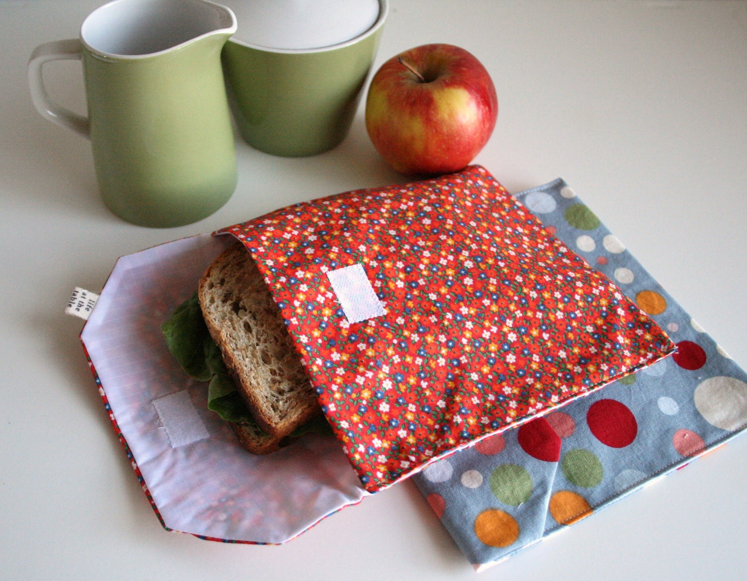 pair of reusable, lined sandwich bags in dot & vintage red floral