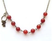 Antiqued Brass Key Red Agate Necklace