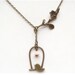 Antiqued Brass Branch  Bird Necklace