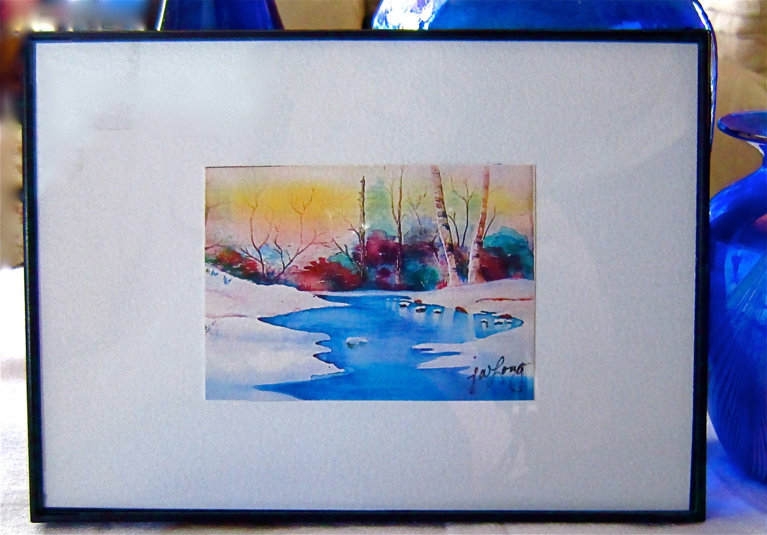 Watercolor Print Snowy River white snow blue river birch trees a yellow-orange glowing sunset green red burgundy foliage