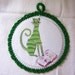 wall art for kids. Cat reading a book - Fabric Pictures in a Crochet frame - Green cotton yarn