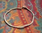 Spider web bracelet.