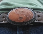 Hand tooled leather yin yang belt buckle, brown and tan, Chinese