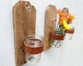 Dog Eared rustic jar sconce made from weathered and reclaimed wood fence picket, leather and mason jar