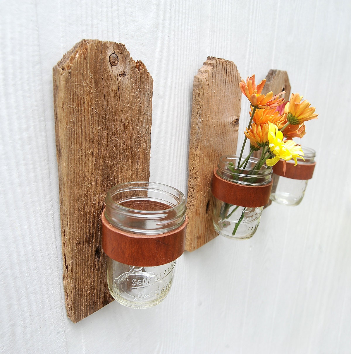 Dog Eared rustic jar sconce made from weathered and reclaimed wood fence picket, leather and mason jar