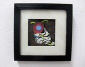 Cyclops Slug, 6"x6", framed collage