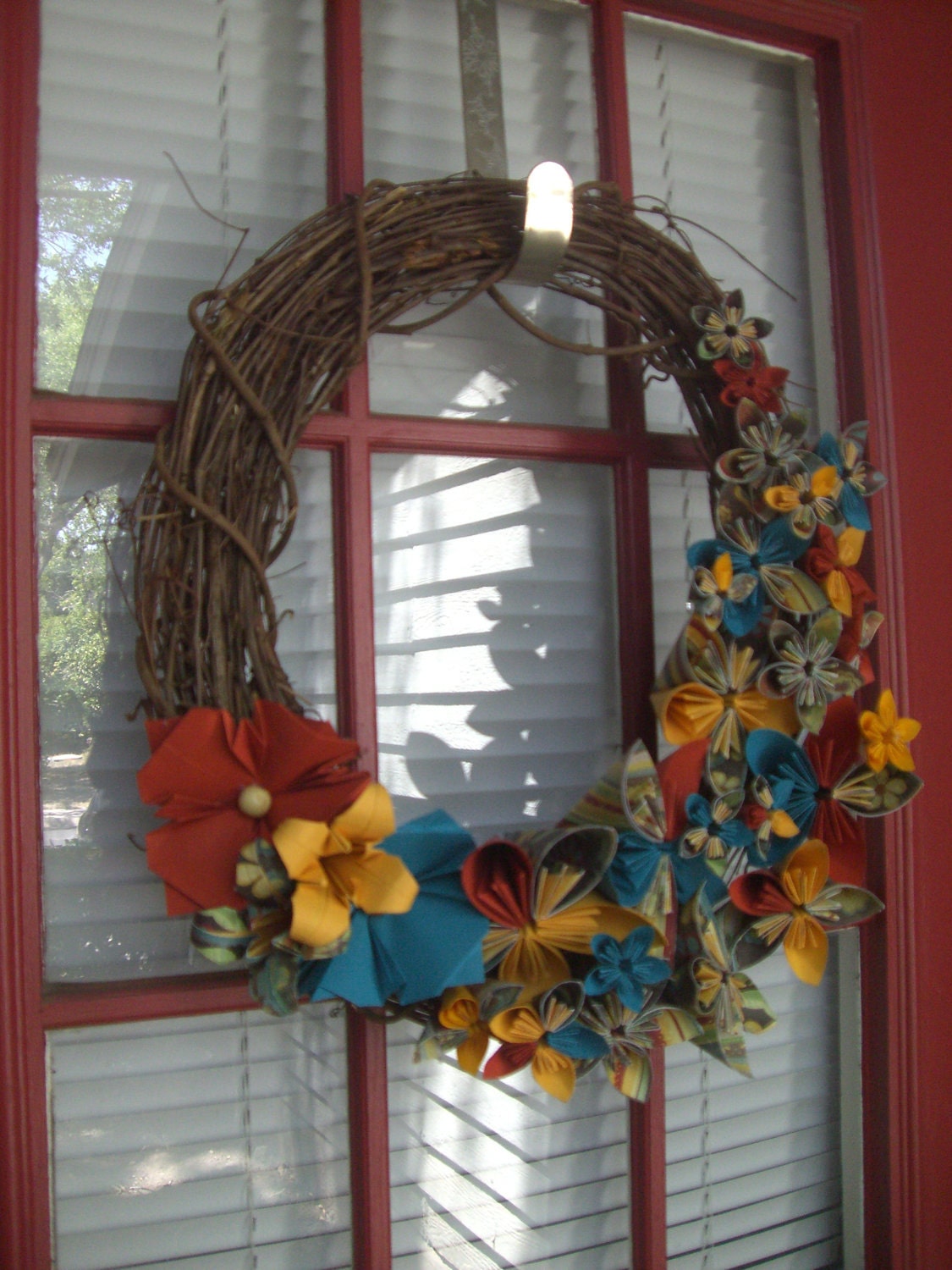 Welcome- Wreath decorated with paper flowers
