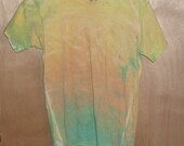 Youth Tie-dye T-shirt. Size 30-32. Unisex fashion. Blue, Green, Yellow, Orange and White.