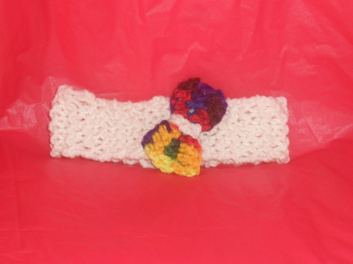 Lovely White Knitted Headband with a unique Multicolored Bow