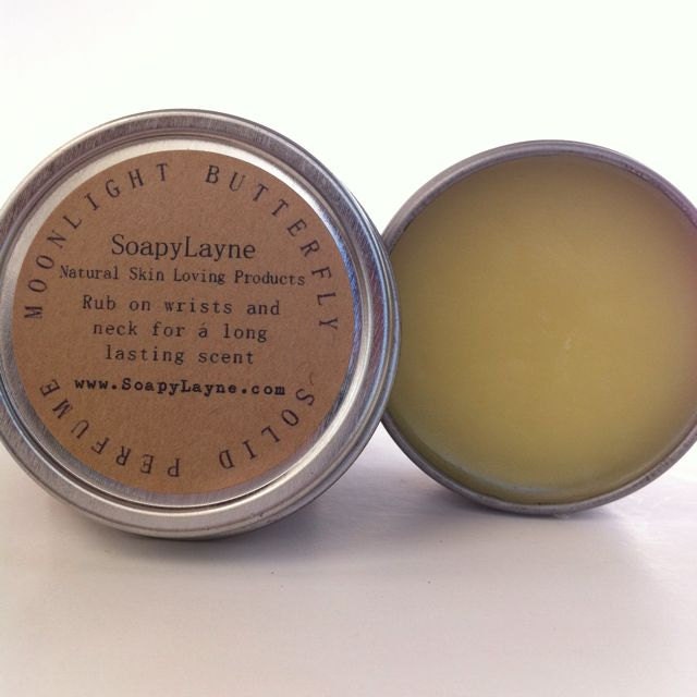 solid perfume, moonlight butterfly- essential oils of geranium rose, ylang ylang, sweet orange & patchouli