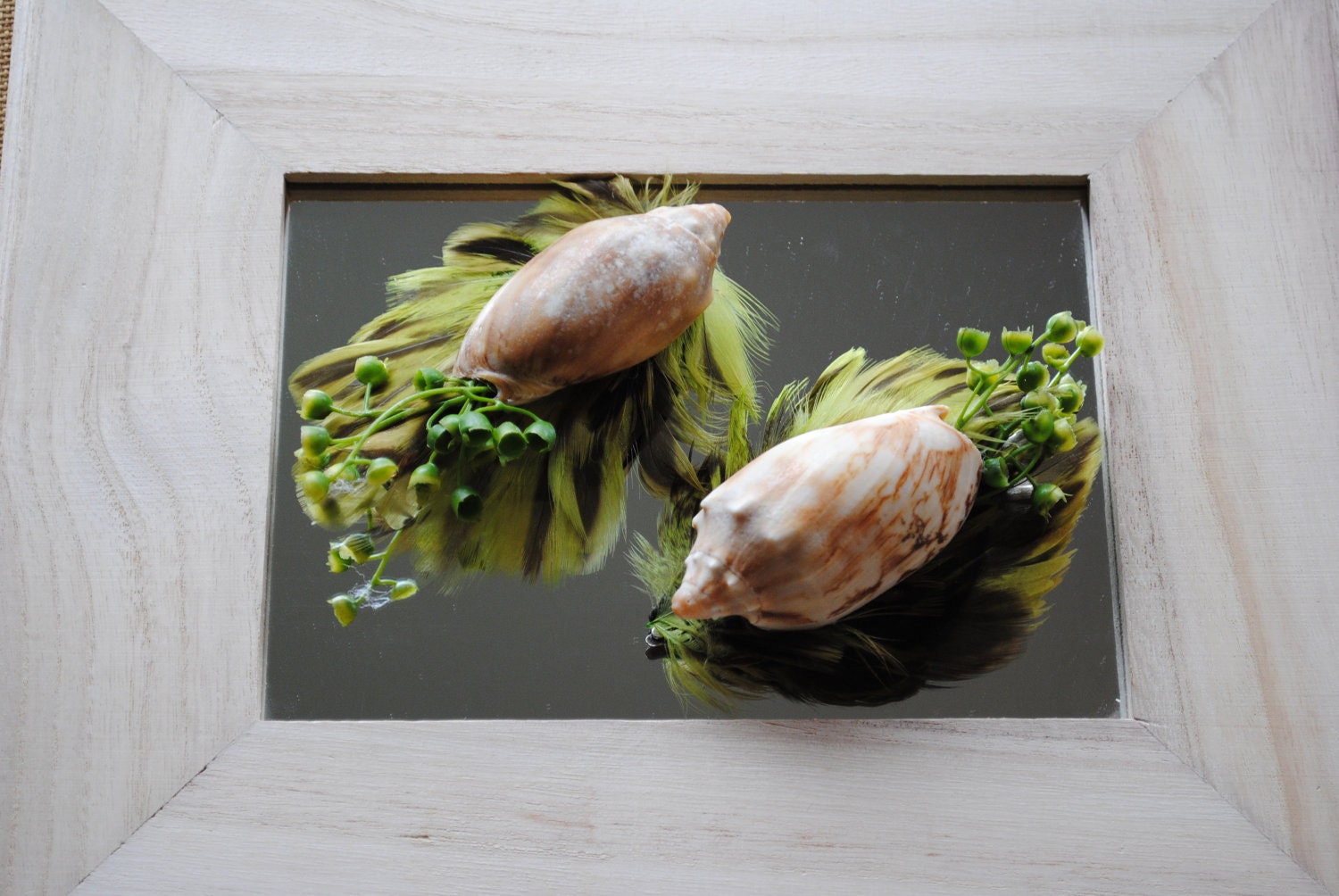 Golden shell and green feather fascinator clip