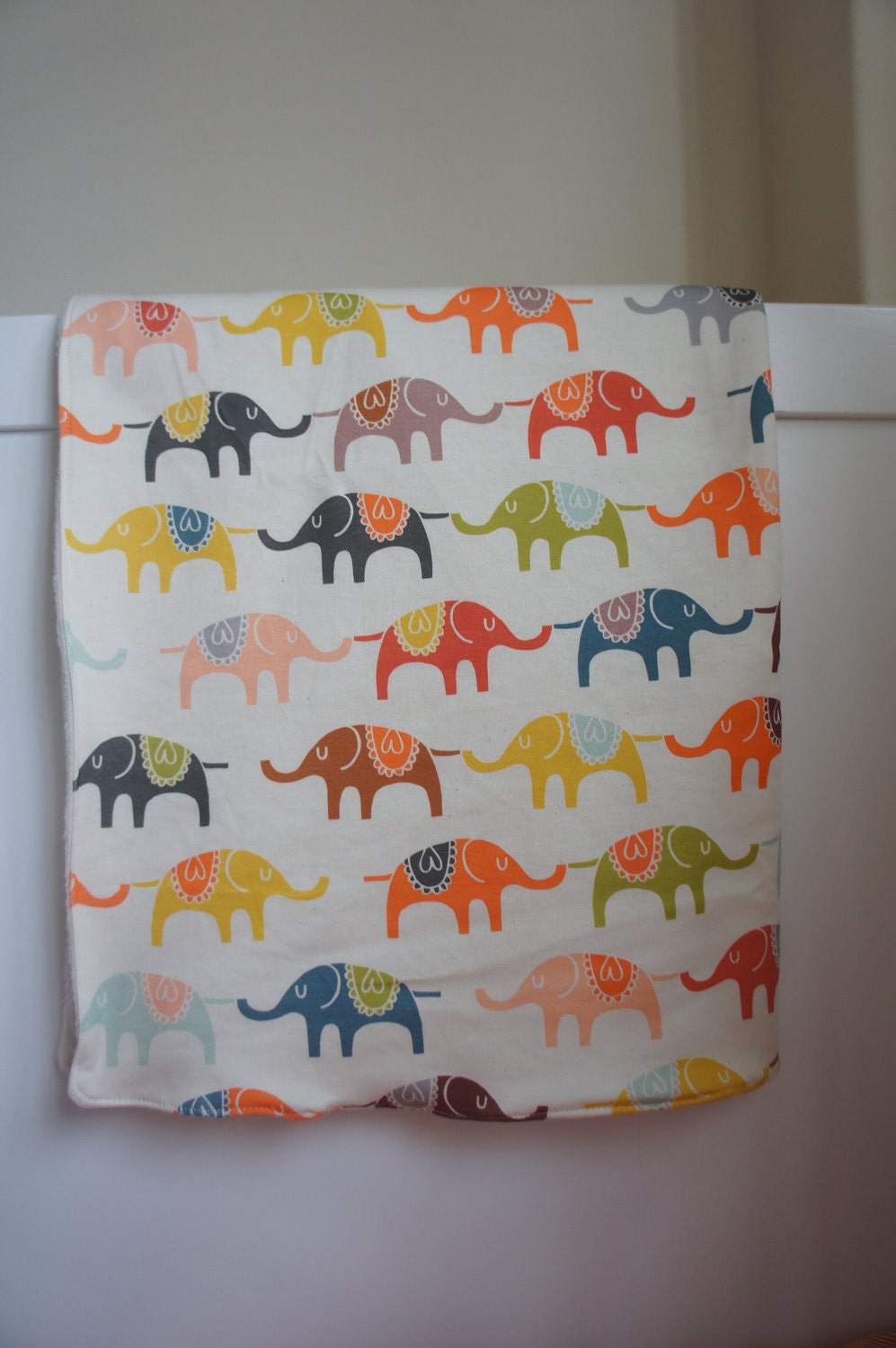 Rainbow Organic Baby Blanket: Circus Troupe on Elephant Parade printed on Cotton Jersey with cream Poly Fleece blanket.