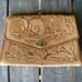 Vintage Leather Clutch w/ Genuine Handcrafted Detail and Metal Clasp.  Made in Mexico.