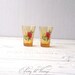 Vintage amber shot glasses with floral print