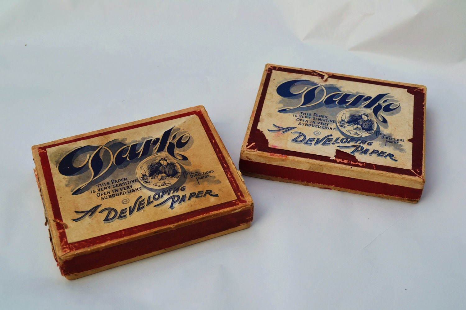 Two boxes of glass negatives from the turn of the century