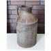 Rusty Cream Can Milk Jug