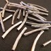 Silver Plated Curved Tube Beads, Twisted Texture, 20mm, 15 pieces