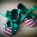 red and white striped christmas shoes