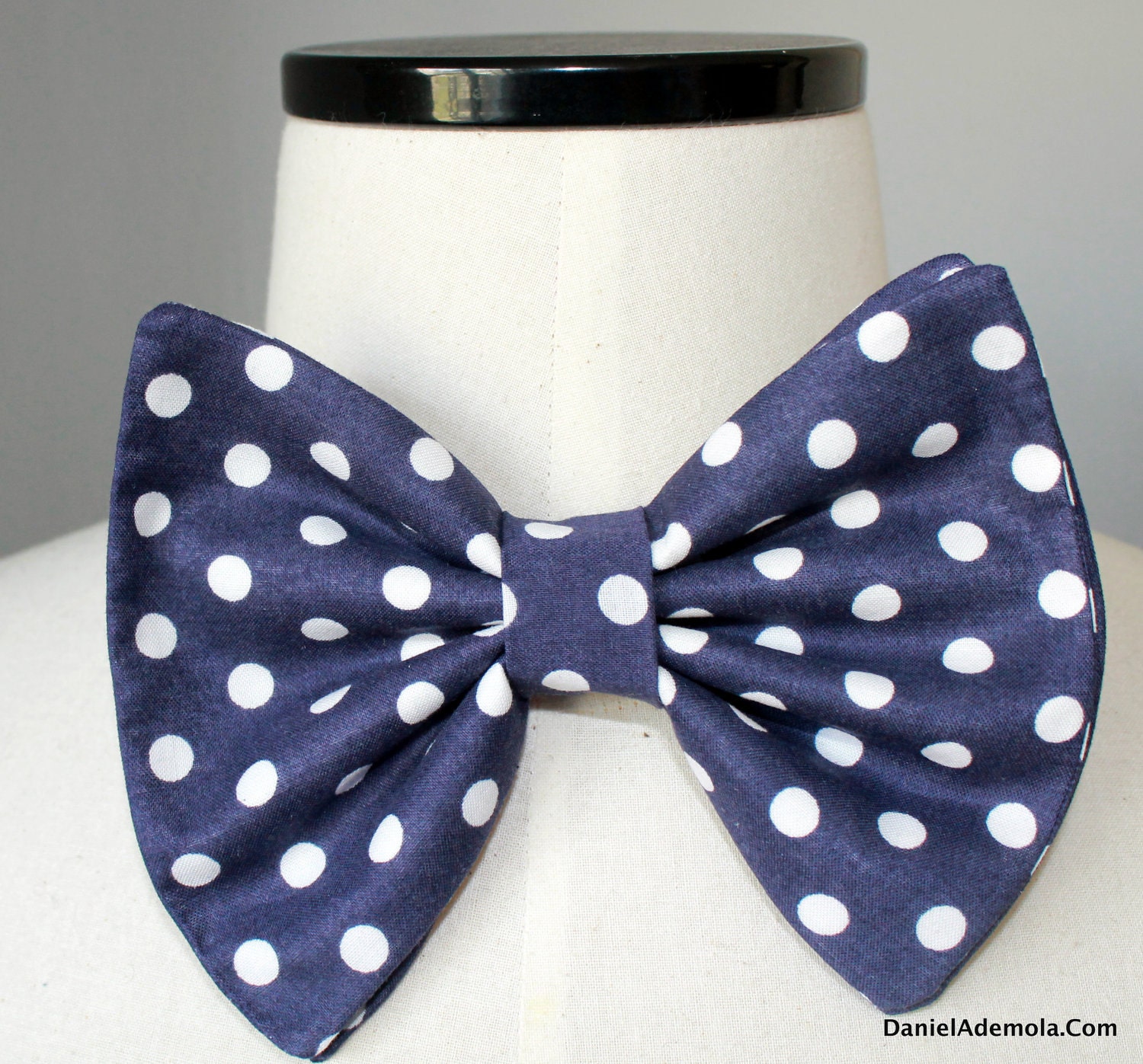 Navy blue and white polka dot bow tie