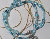 Cancer awareness bracelet in teal.