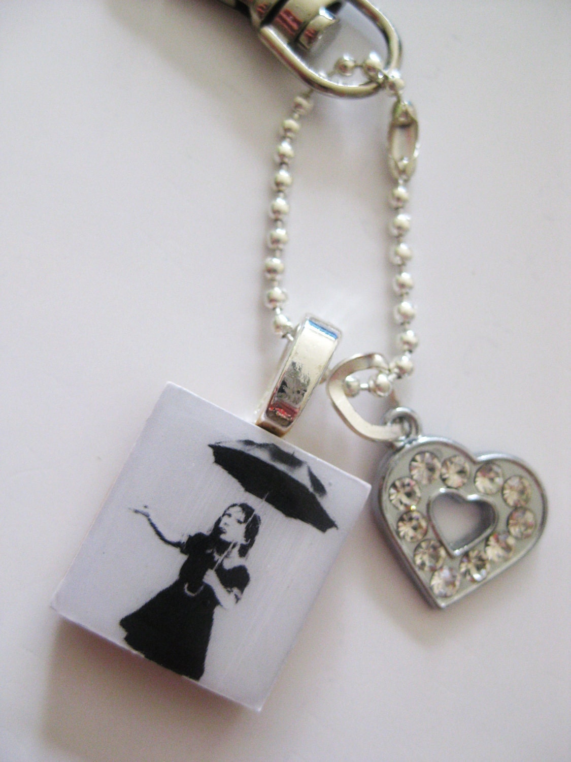 Banksy Street Art Style Girl with Umbrella crystal heart key/bag charm