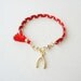 Coral red cotton braid bracelet