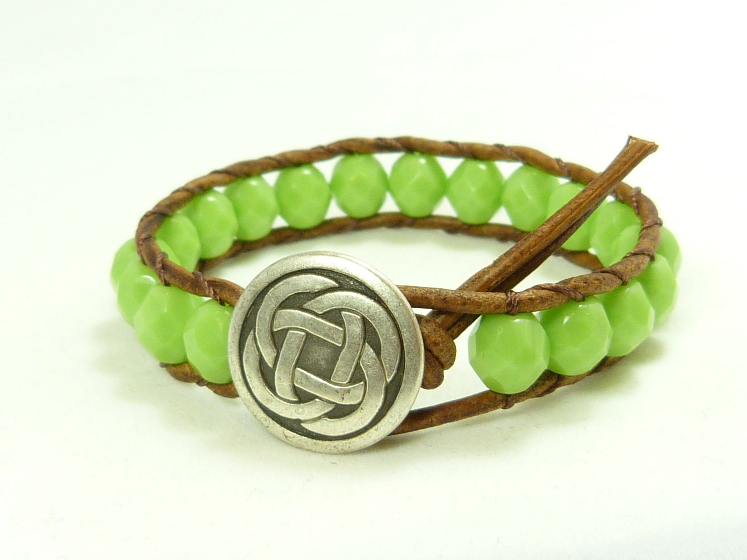Beaded leather wrap bracelet, light spring green, celtic button closure, rustic southwestern charm.
