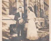 Vintage/Antique photo of a couple outside their home