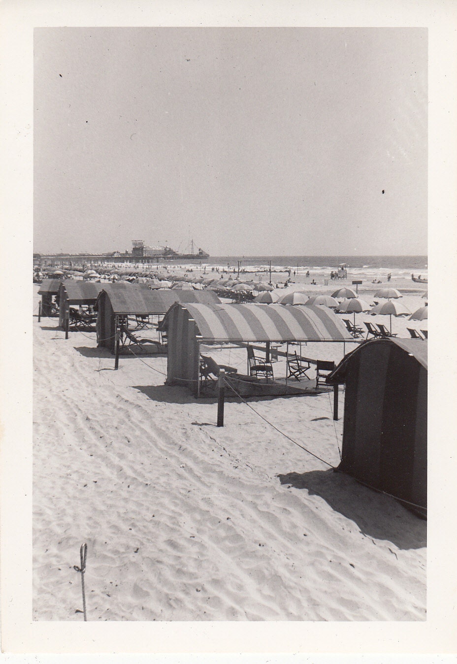 Vintage/ Antique Photo of beautiful cabanas and pier at the beach