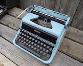 Turquoise Typewriter Underwood Golden Touch by designer Raymond Spilman