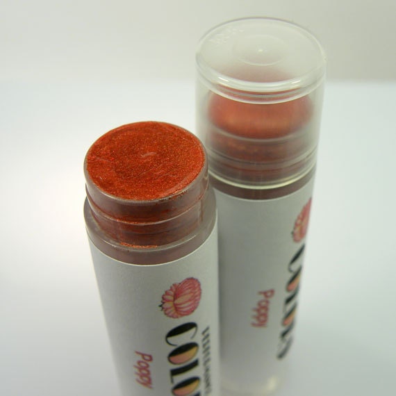 POPPY Restorative Lipcolor in deep terra cotta, super sparkly, semi-sheer. 5ml