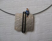 Remembrance silver Pendant from the tiny people line.