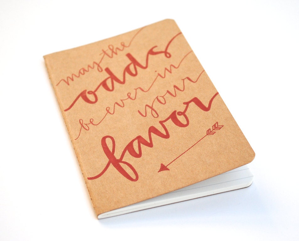 Hunger Games Notebook . Pocket Moleskine Cahier . Red Ink Calligraphy on Brown Kraft . Ruled . May the Odds Be Ever in Your Favor