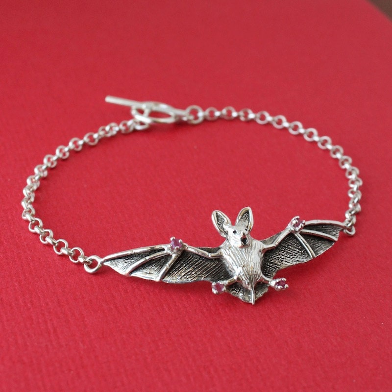 The Bat Bracelet, a custom handmade sterling silver piece.