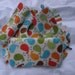 Wipes case and baby changing pad gift set with matching bib, burp cloth and ribbon taggie in Urban Zoologie Bermuda Birds