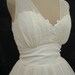 A 50s style cocktail dress lace and chiffon. I specialise in made to measure. All sizes welcome.