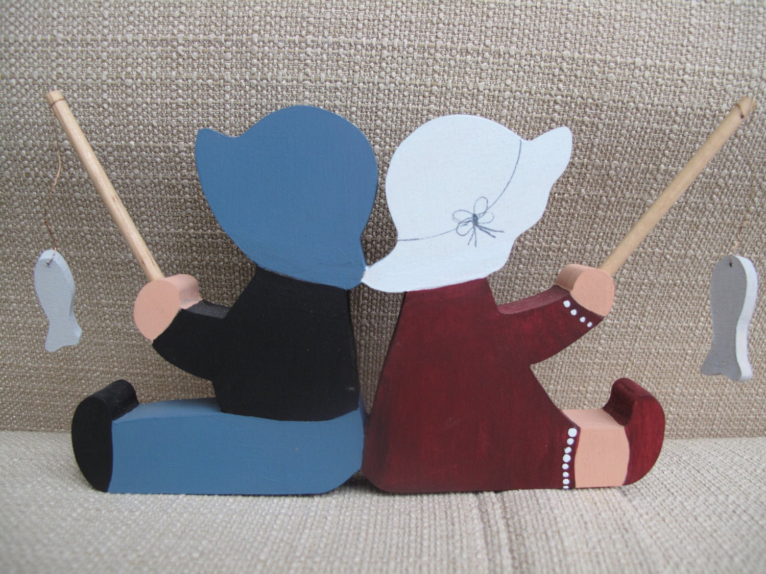 Pair of children fishing