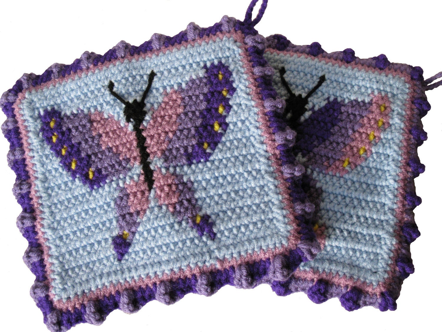 Purple Butterfly Potholders. Crochet butterflies on by hooknsaw