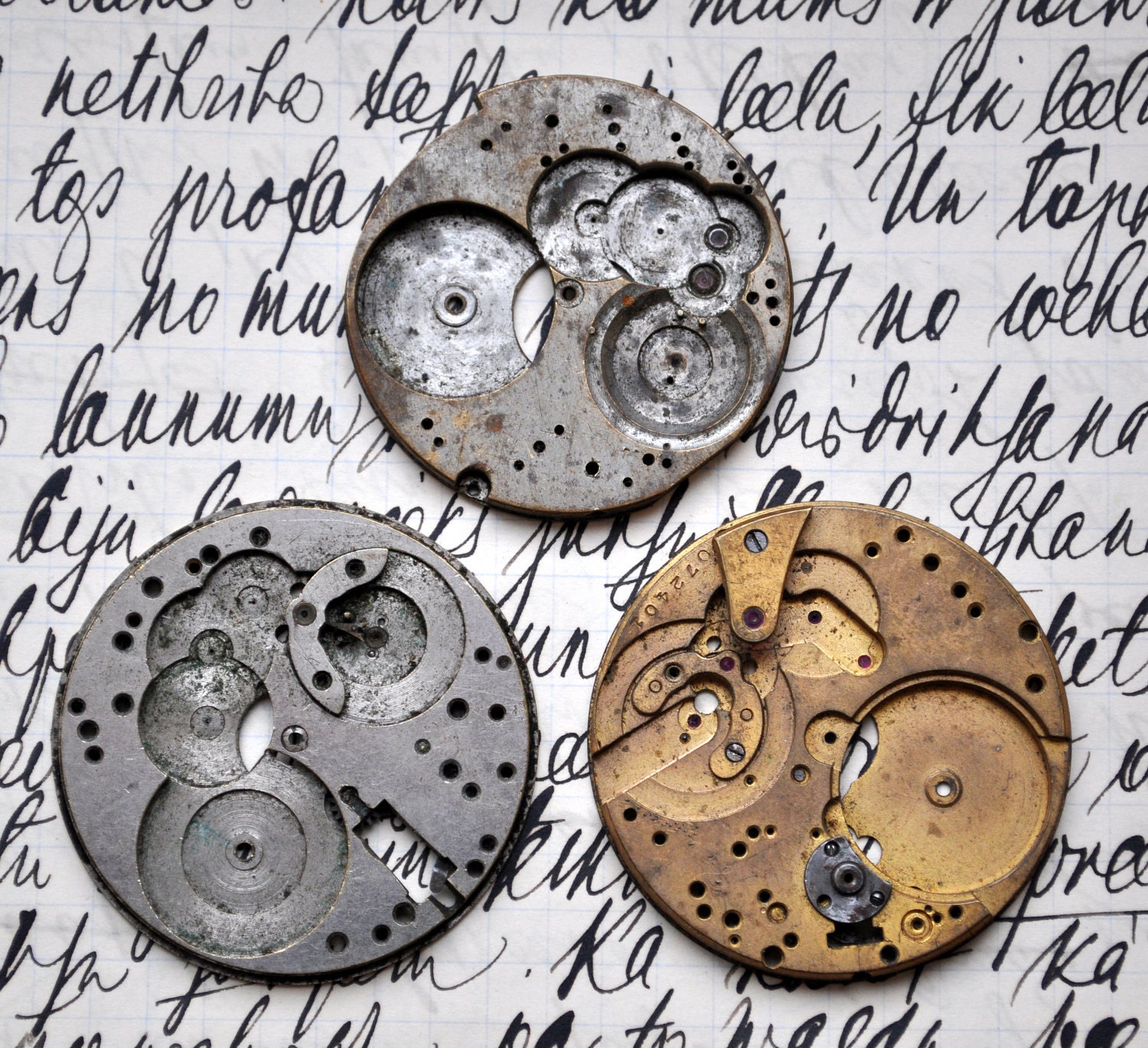 Lot of 3 antique pocket watch movements.