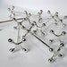 Six antique knife rests, silver plated, by Boulenger, Paris